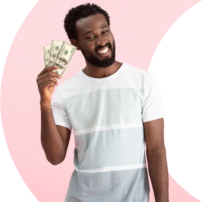 Man holding $300 in cash, smiling and showcasing quick loan solutions